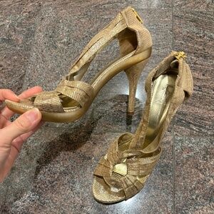 Beautiful Golden color high heels size 8 (fits like size 7)
